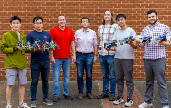 The research team with their robots.