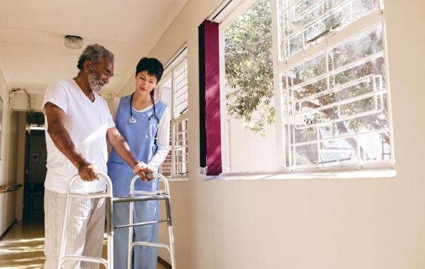 Nursing home clinician with patient