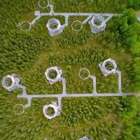 Yurt-like test chambers in a natural boreal spruce bog in northern Minnesota (provided). Yurt-like test chambers in a natural boreal spruce bog in northern Minnesota (provided).